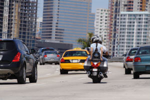 motorcycle on highway during day