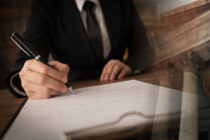 lawyer sitting with legal papers