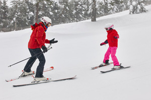 Children learning how to ski