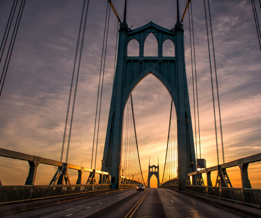 St Johns bridge and a car with sunrise